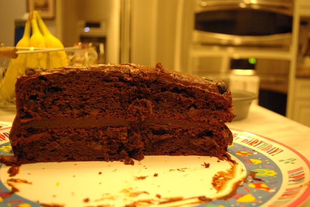 Triple Chocolate Blueberry Cake - two layers of chocolate cake with chocolate buttercream and blueberry chocolate ganache #blueberry #chocolate #cake | www.thebatterthickens.com