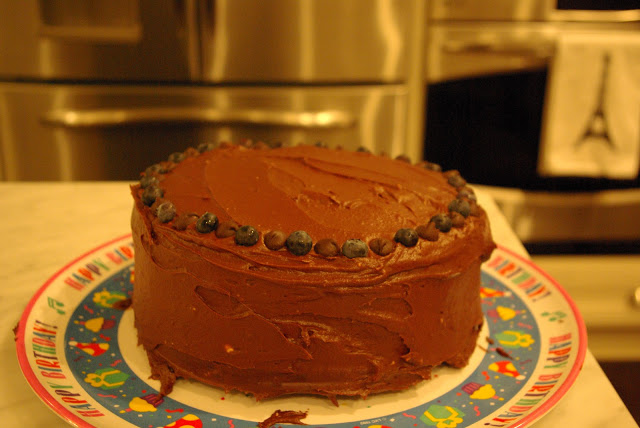 Triple Chocolate Blueberry Cake - two layers of chocolate cake with chocolate buttercream and blueberry chocolate ganache #blueberry #chocolate #cake | www.thebatterthickens.com