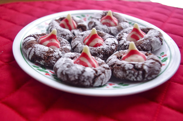 Chocolate Crinkle Candy Cane Kiss Cookies - chocolate cookies with Hershey's peppermint kisses | www.thebatterthickens.com