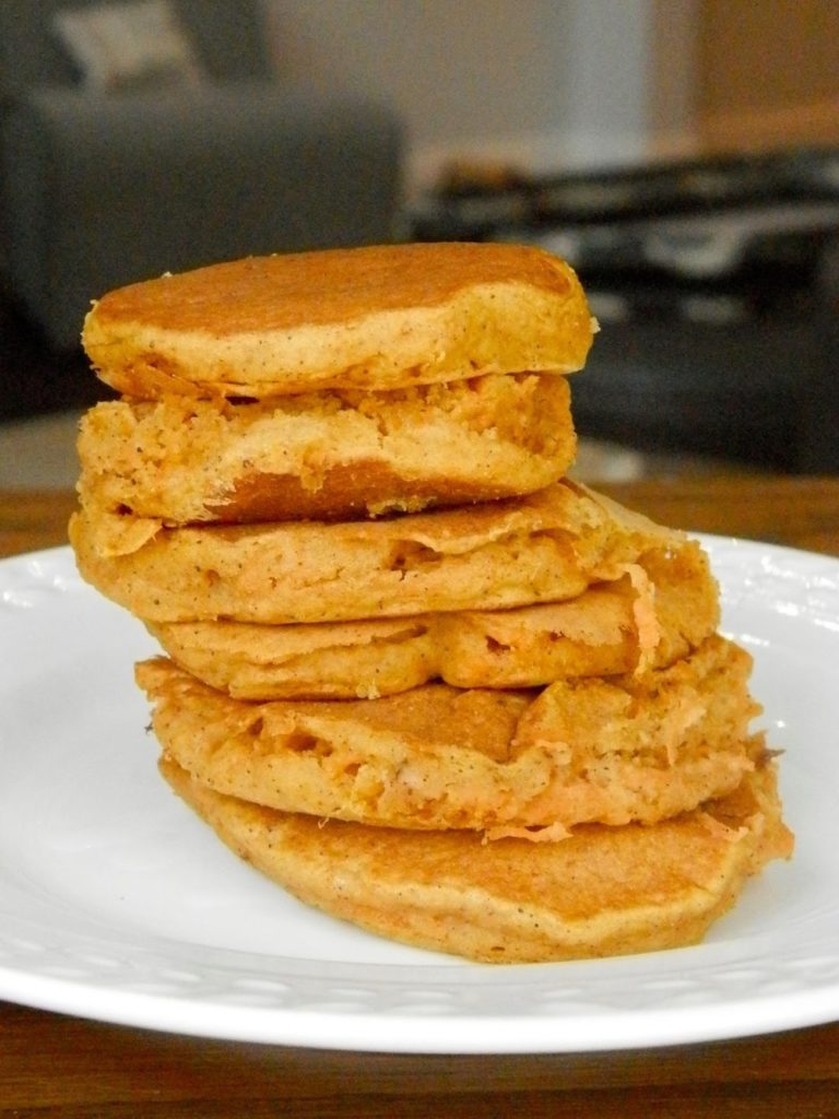 Carrot Cake Pancakes - topped with cream cheese spread, a fresh take on pancakes #breakfast #pancakes | www.thebatterthickens.com