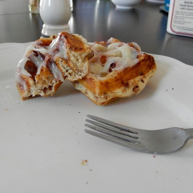 Cinnamon Roll Waffles - make these in a waffle iron and drizzle with homemade cream cheese "syrup" | www.thebatterthickens.com