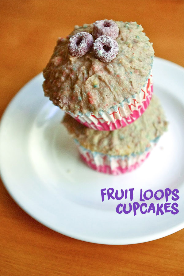 Fruit Loops Cupcakes - All part of a complete breakfast! With Fruit Loops blended right into the frosting, one bite will instantly transport you back to childhood (or delight your kiddos!) #cupcakes #fruitloops #cereal #kidsbaking #dessert #bakingrecipe | www.thebatterthickens.com