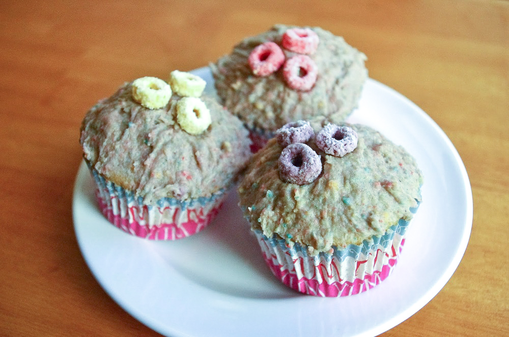 Fruit Loops Cupcakes - All part of a complete breakfast! With Fruit Loops blended right into the frosting, one bite will instantly transport you back to childhood (or delight your kiddos!) #cupcakes #fruitloops #cereal #kidsbaking #dessert #bakingrecipe | www.thebatterthickens.com