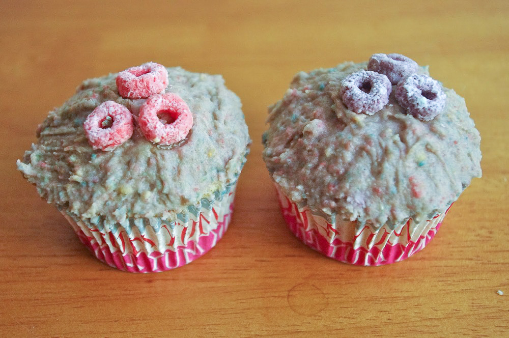 Fruit Loops Cupcakes - All part of a complete breakfast! With Fruit Loops blended right into the frosting, one bite will instantly transport you back to childhood (or delight your kiddos!) #cupcakes #fruitloops #cereal #kidsbaking #dessert #bakingrecipe | www.thebatterthickens.com