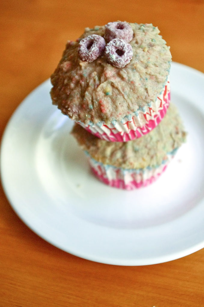 Fruit Loops Cupcakes - All part of a complete breakfast! With Fruit Loops blended right into the frosting, one bite will instantly transport you back to childhood (or delight your kiddos!) #cupcakes #fruitloops #cereal #kidsbaking #dessert #bakingrecipe | www.thebatterthickens.com