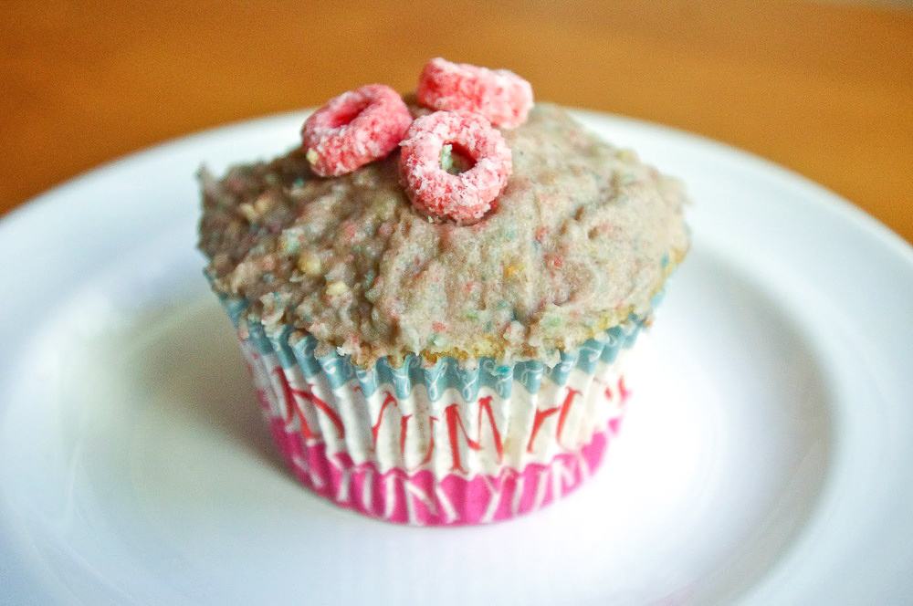Fruit Loops Cupcakes - All part of a complete breakfast! With Fruit Loops blended right into the frosting, one bite will instantly transport you back to childhood (or delight your kiddos!) #cupcakes #fruitloops #cereal #kidsbaking #dessert #bakingrecipe | www.thebatterthickens.com