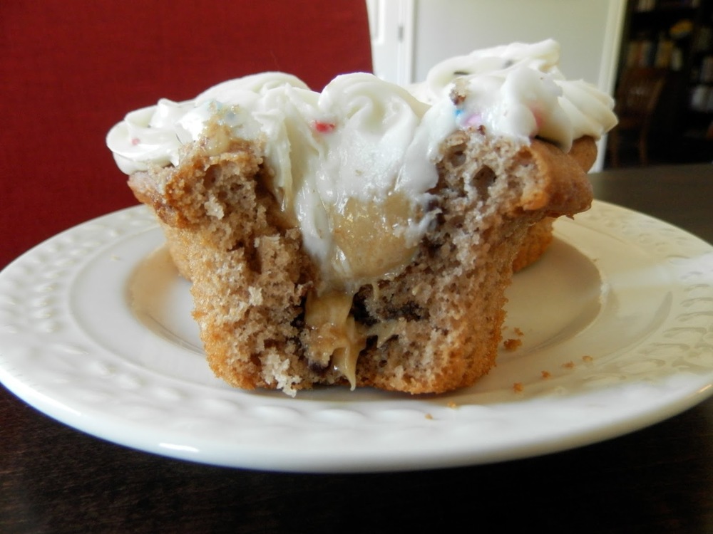 Nutella Peanut Butter Marshmallow Cupcakes - a mashup of Nutella, peanut butter, and marshmallow fluff, these #cupcakes are perfect for kids, or for the inner child in all of us. #peanutbutter #nutella #marshmallowfluff | www.thebatterthickens.com