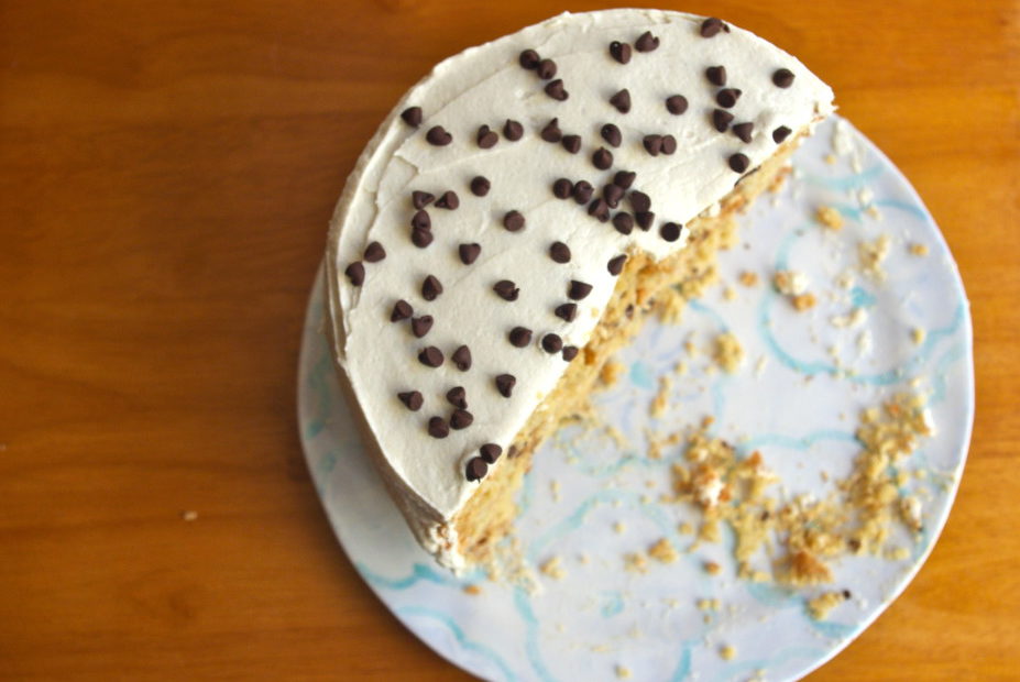 Peanut Butter Chocolate Chip Cookie Dough Cake - three layers of peanut butter cake with chocolate chips, covered in peanut butter cookie dough frosting, a peanut butter lover's fantasy #peanutbutter #chocolatechip #cookiedough #cake | www.thebatterthickens.com