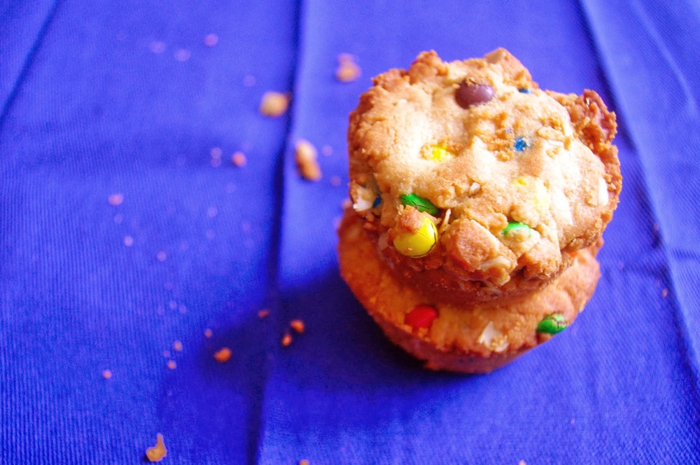 Reese's Stuffed Monster Cookie Cups - thick and chewy monster cookie cups with a mini Reese's stuffed inside | www.thebatterthickens.com