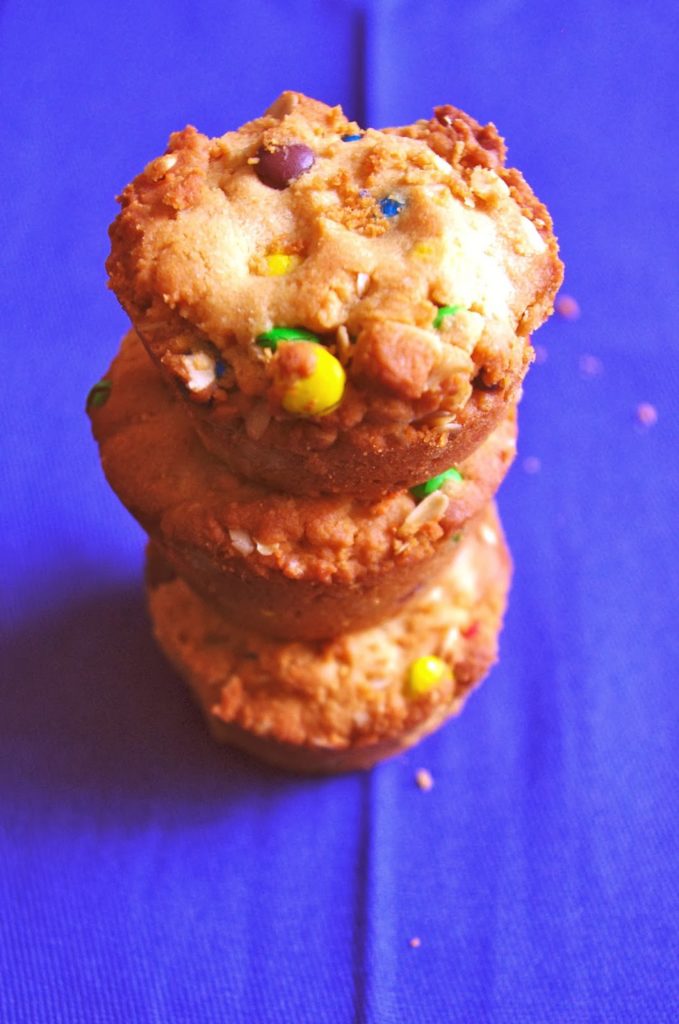 Reese's Stuffed Monster Cookie Cups - thick and chewy monster cookie cups with a mini Reese's stuffed inside | www.thebatterthickens.com