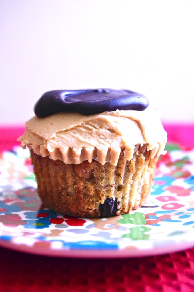 Peanut Butter Banana Chocolate Chip Cupcakes - banana cupcakes with peanut butter and chocolate chips, peanut butter frosting, and chocolate ganache #peanutbutter #banana #cupcakes #ganache | www.thebatterthickens.com