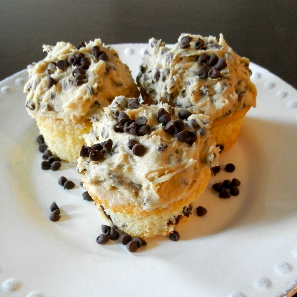 Half-Baked Ice Cream - vanilla cupcakes with brownie batter chunks and cookie dough frosting #halfbaked #cupcakes #cookiedough | www.thebatterthickens.com