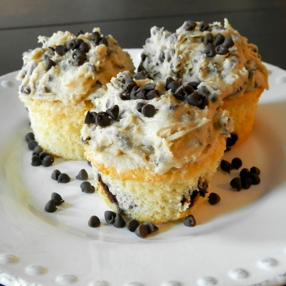 Half-Baked Ice Cream - vanilla cupcakes with brownie batter chunks and cookie dough frosting #halfbaked #cupcakes #cookiedough | www.thebatterthickens.com