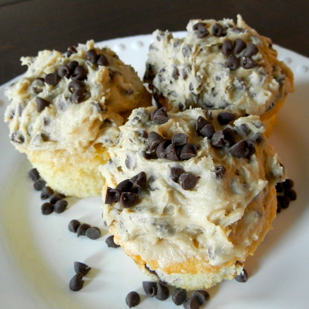 Half-Baked Ice Cream - vanilla cupcakes with brownie batter chunks and cookie dough frosting #halfbaked #cupcakes #cookiedough | www.thebatterthickens.com