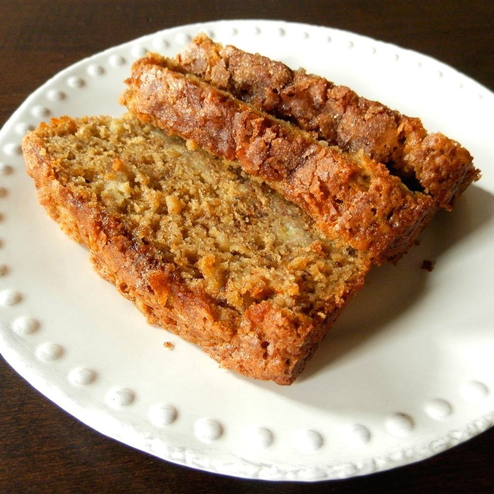 Maple Olive Oil Banana Bread - whole wheat, banana, olive oil, and maple syrup make this a wholesome and tasty breakfast treat #bananabread | www.thebatterthickens.com