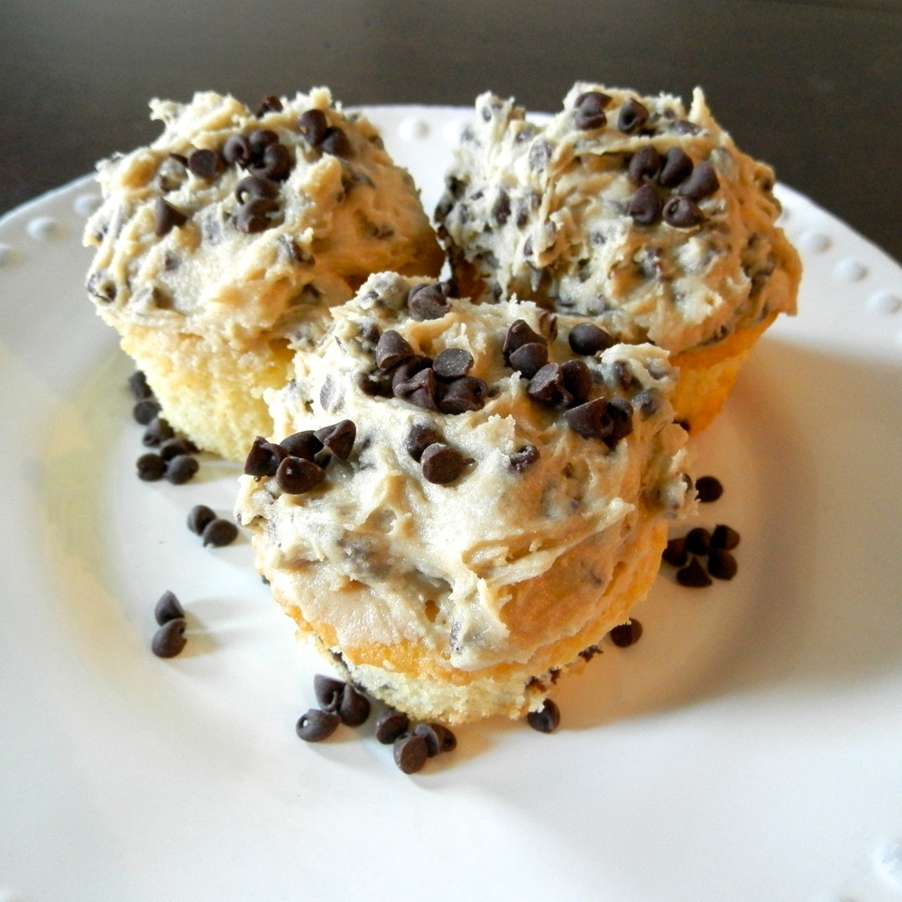 Half-Baked Ice Cream - vanilla cupcakes with brownie batter chunks and cookie dough frosting #halfbaked #cupcakes #cookiedough | www.thebatterthickens.com