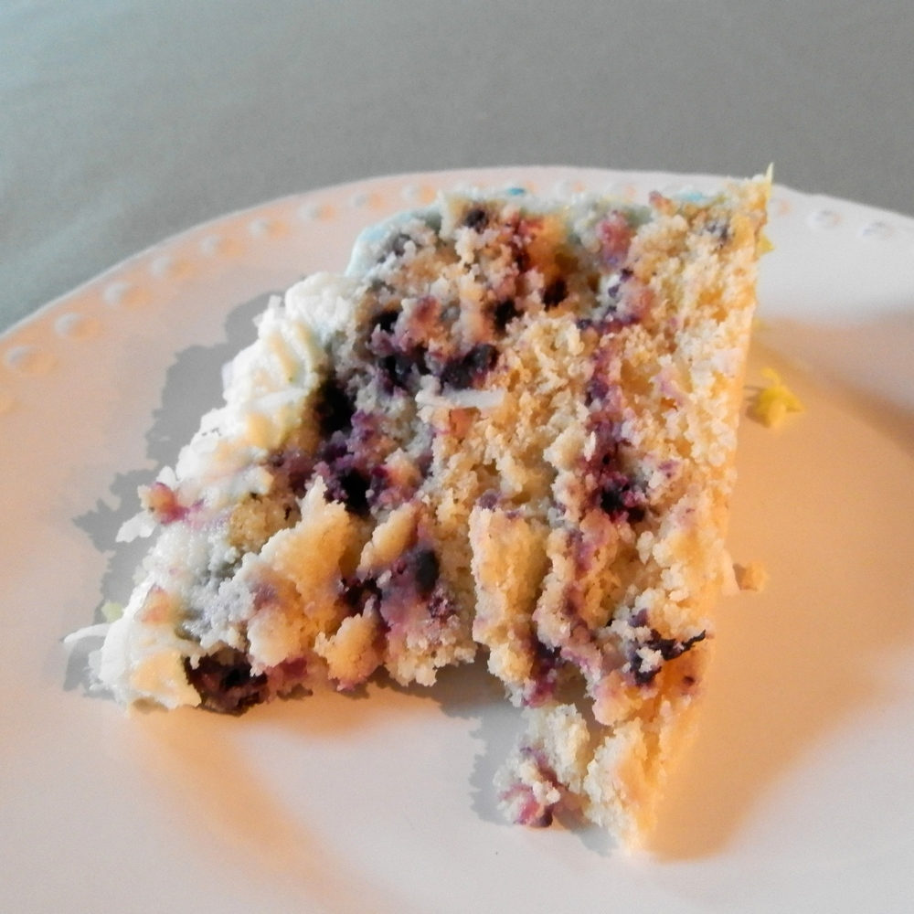 Lemon Blueberry Cake with Coconut Cream Cheese Frosting | www.thebatterthickens.com