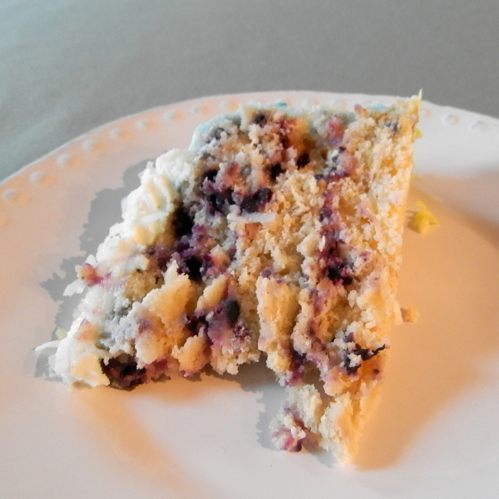 Lemon Blueberry Cake with Coconut Cream Cheese Frosting | www.thebatterthickens.com