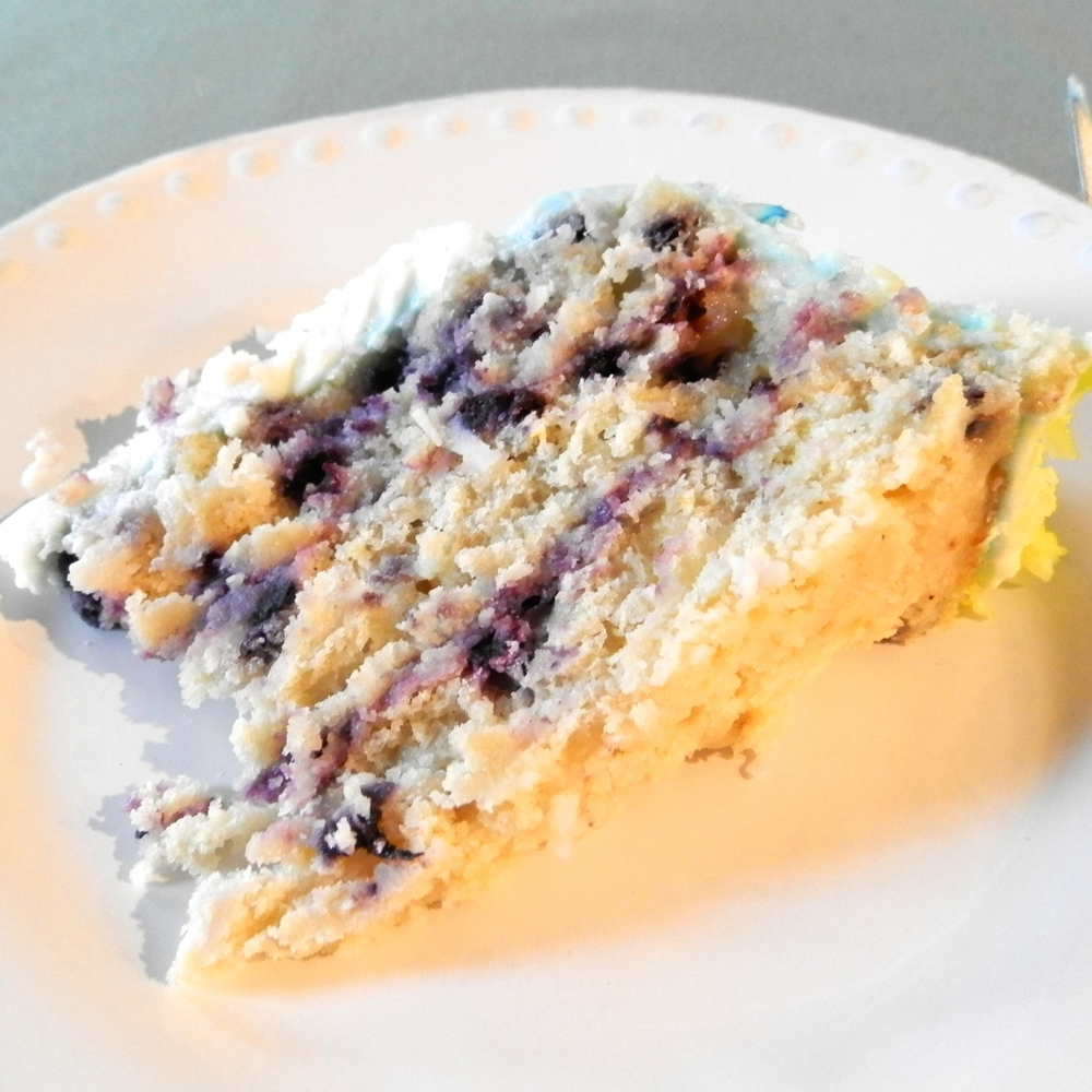 Lemon Blueberry Cake with Coconut Cream Cheese Frosting | www.thebatterthickens.com