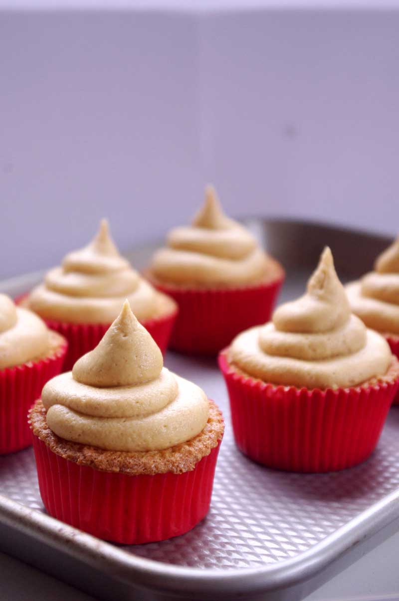 Ritz Cracker Cupcakes -- with peanut butter frosting and nutella filling, these cupcakes are your after school snack dreams brought to life | www.thebatterthickens.com