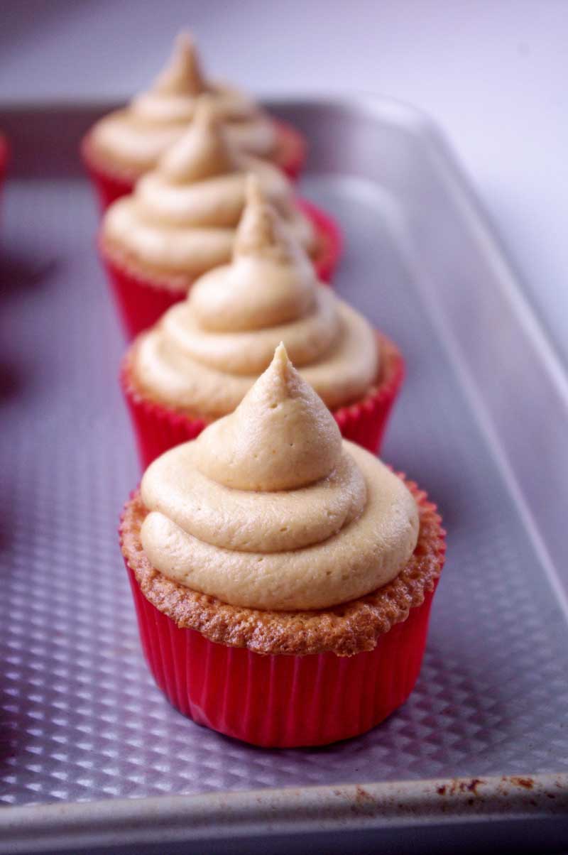 Ritz Cracker Cupcakes -- with peanut butter frosting and nutella filling, these cupcakes are your after school snack dreams brought to life | www.thebatterthickens.com