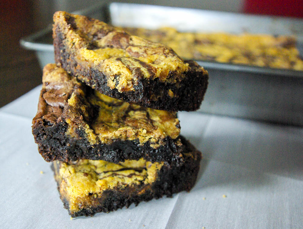 Pumpkin Cookie Swirled Brownies are brownies swirled with pumpkin cinnamon chip cookie dough - www.thebatterthickens.com