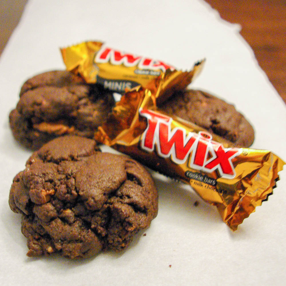 Twix Cookies - chocolate cookie with peanut butter chunks and Twix bar | www.thebatterthickens.com