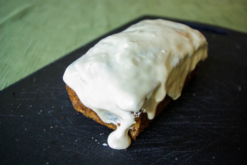 Carrot Zucchini Bread - carrots add an extra sweetness to this moist zucchini bread, topped with luscious maple cream cheese glaze #quickbread #zucchinibread #zucchini #carrot | www.thebatterthickens.com