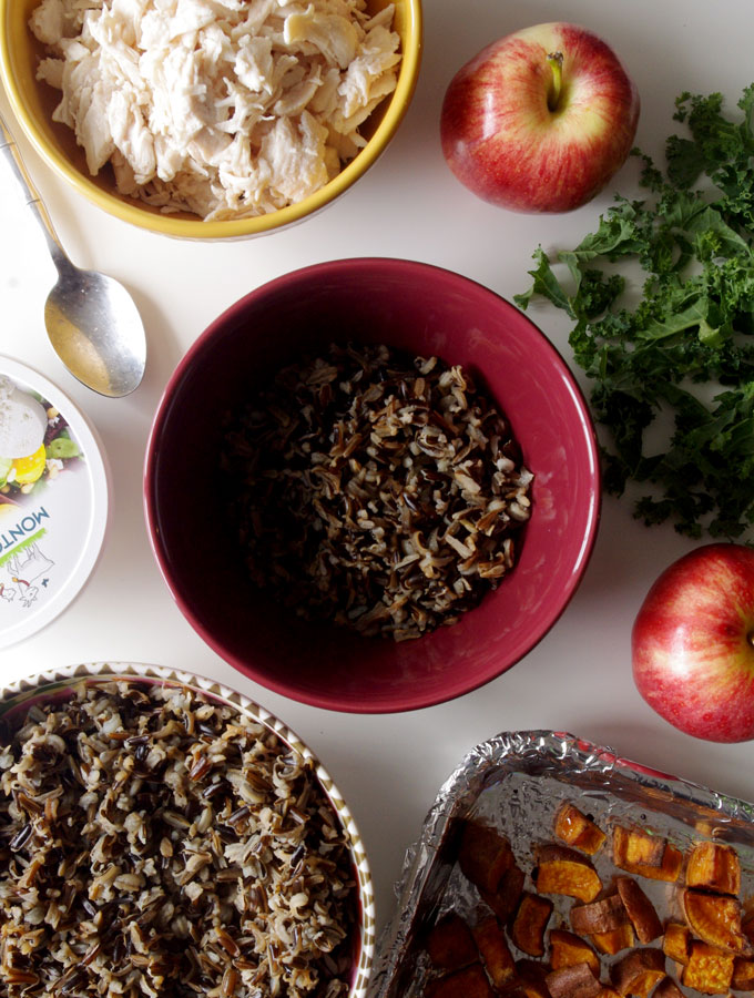 Fall Harvest Bowl - wild rice, roasted sweet potatoes, kale, apples, and goat cheese | www.thebatterthickens #harvestbowl #sweetpotato #wildrice