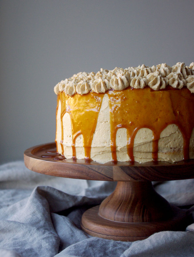 Pumpkin Spice Overdose Cake - 3 layers of soft pumpkin cake filled with pumpkin ganache and pumpkin salted caramel with pumpkin frosting and decorated with pumpkin whipped cream, aka ALL THE PUMPKIN! | www.thebatterthickens.com 