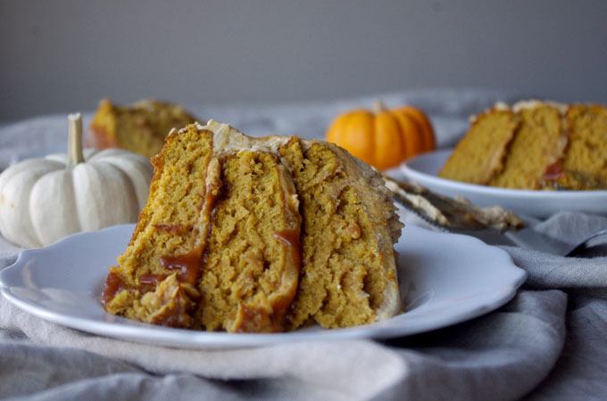 Pumpkin Spice Overdose Cake - 3 layers of soft pumpkin cake filled with pumpkin ganache and pumpkin salted caramel with pumpkin frosting and decorated with pumpkin whipped cream, aka ALL THE PUMPKIN! | www.thebatterthickens.com 