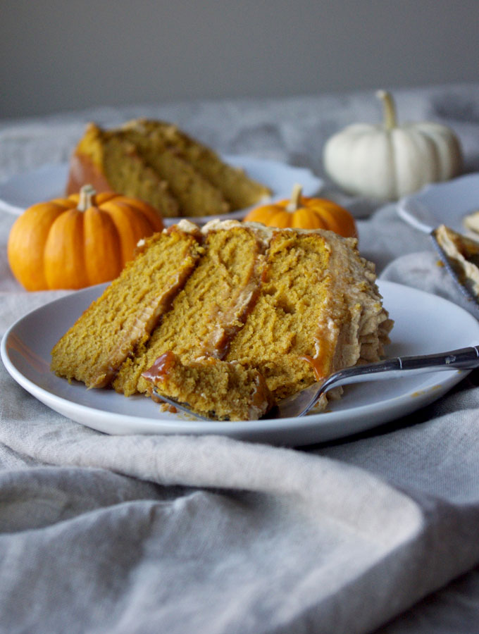 Pumpkin Spice Overdose Cake - 3 layers of soft pumpkin cake filled with pumpkin ganache and pumpkin salted caramel with pumpkin frosting and decorated with pumpkin whipped cream, aka ALL THE PUMPKIN! | www.thebatterthickens.com