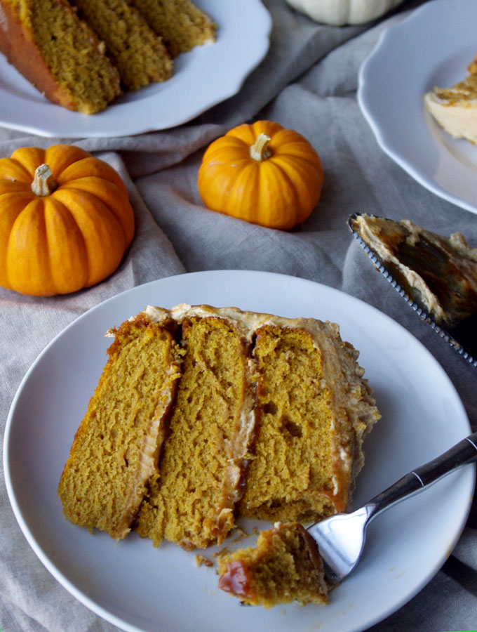 Pumpkin Spice Overdose Cake - 3 layers of soft pumpkin cake filled with pumpkin ganache and pumpkin salted caramel with pumpkin frosting and decorated with pumpkin whipped cream, aka ALL THE PUMPKIN! | www.thebatterthickens.com 