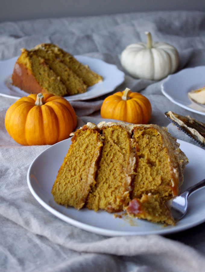 Pumpkin Spice Overdose Cake - 3 layers of soft pumpkin cake filled with pumpkin ganache and pumpkin salted caramel with pumpkin frosting and decorated with pumpkin whipped cream, aka ALL THE PUMPKIN! | www.thebatterthickens.com 