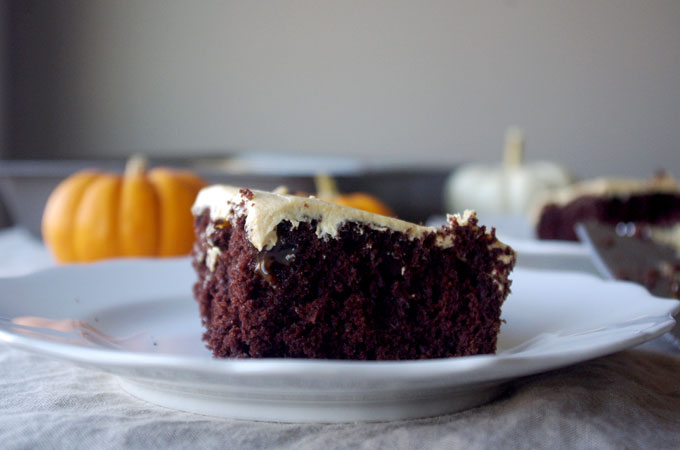 Chocolate Pumpkin Caramel Poke Cake - made with box chocolate cake, this #pumpkin #caramel poke cake is so easy to make but tastes completely homemade, and will delight family and guests throughout the holiday season! | www.thebatterthickens.com