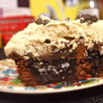 Parent Trap Brownies are stuffed with peanut butter and Oreos and covered in peanut butter frosting | www.thebatterthickens.com