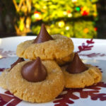 Peanut Butter Blossoms - classic Christmas cookie recipe with Hershey's kisses #peanutbutter #cookies | www.thebatterthickens.com