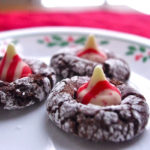 Chocolate Crinkle Candy Cane Kiss Cookies - chocolate cookies with Hershey's peppermint kisses | www.thebatterthickens.com