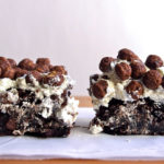 Cocoa Puffs Brownies - kind of like childhood breakfast meets afternoon snack, with malty brownie base, milk-y meringue frosting, and topped with cocoa puffs! #brownies #dessert #cereal #cocoapuffs | www.thebatterthickens.com
