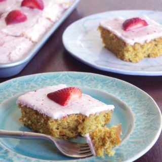 Coconut Carrot Sheet Cake with Strawberry Mascarpone Frosting | A moist carrot cake made with coconut and topped with a sweet, tart strawberry mascarpone frosting | www.thebatterthickens.com